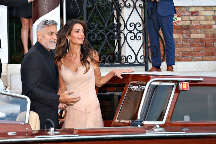 George and Amal Clooney sail into the scene in Venice.
