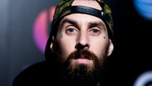Travis Barker Leaves Tour For ‘Urgent Family Matter,’ Reportedly Posts From Prayer Room