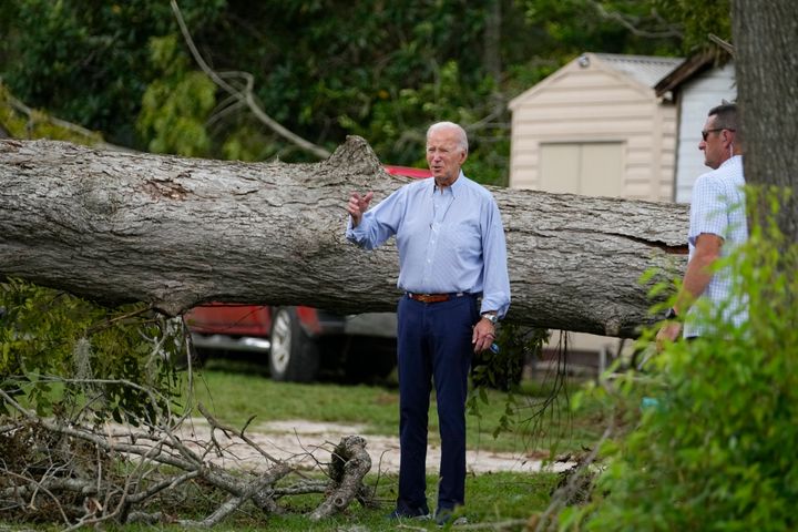 President Joe Biden surveys damage caused by Hurricane Idalia, Saturday, Sept. 2, 2023, in Live Oak, Fla. (AP Photo/Julio Cortez)