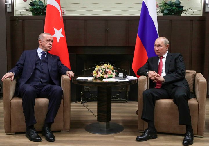 Russian President Vladimir Putin, right, and Turkish President Recep Tayyip Erdogan talk to each other during their meeting in the Bocharov Ruchei residence in the Black Sea resort of Sochi, Russia, Wednesday, Sept. 29, 2021. Erdogan will meet with Putin on Monday, Sept. 4, 2023 in a bid to persuade the Russian leader to rejoin the Black Sea grain deal that Moscow broke off from in July. 