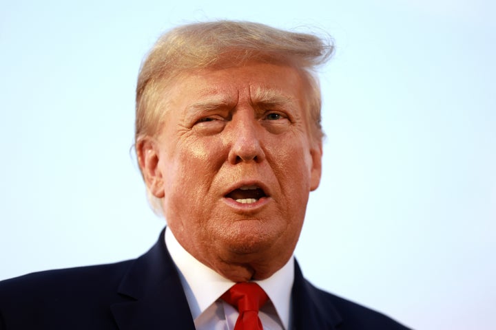 Donald Trump speaks to the media after being booked at the Fulton County jail in Atlanta, Georgia, on Aug. 24.