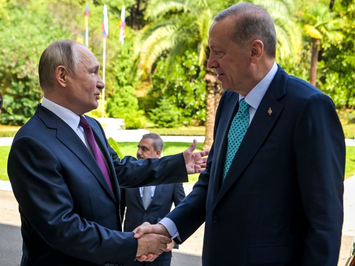 Russian President Vladimir Putin, left, greets Turkish President Recep Tayyip Erdogan upon his arrival at Russia's Black Sea resort of Sochi, Russia, on Sept. 4, 2023. 