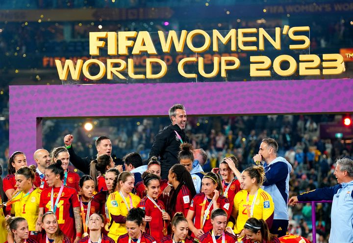 Spain manager Jorge Vilda (top) celebrates with his players after winning the FIFA Women's World Cup final match at Stadium Australia, Sydney. Picture date: Sunday August 20, 2023. (Photo by Zac Goodwin/PA Images via Getty Images)