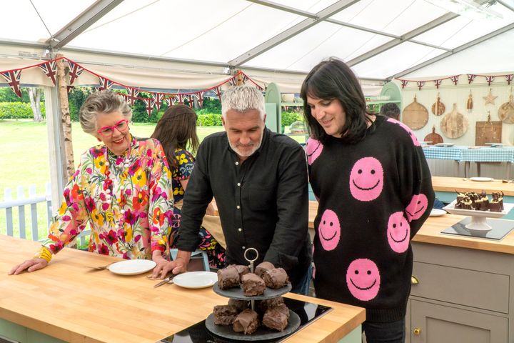 "The Great British Bake Off" judges Dame Prue Leith (left) and Paul Hollywood and co-host Noel Fielding on a 2021 episode of the show.