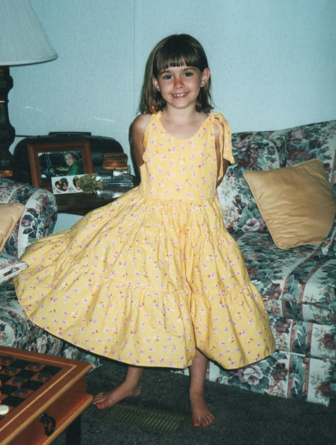 The author at their grandparents' house in 2002.