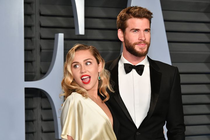 Miley Cyrus and Liam Hemsworth attend the 2018 Vanity Fair Oscar Party hosted on March 4, 2018 in Beverly Hills. 