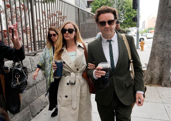 Danny Masterson, right, and his wife Bijou Phillips arrive for closing arguments in his second trial on May 16 in Los Angeles. A jury found “That ’70s Show” star Masterson guilty of two counts of rape Wednesday, May 31, in a Los Angeles retrial in which the Church of Scientology played a central role.