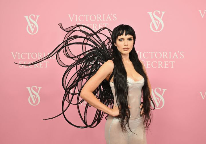 Fox's "relatively modest" look at the Victoria's Secret event included a semi-sheer silver gown and black angel wings. 