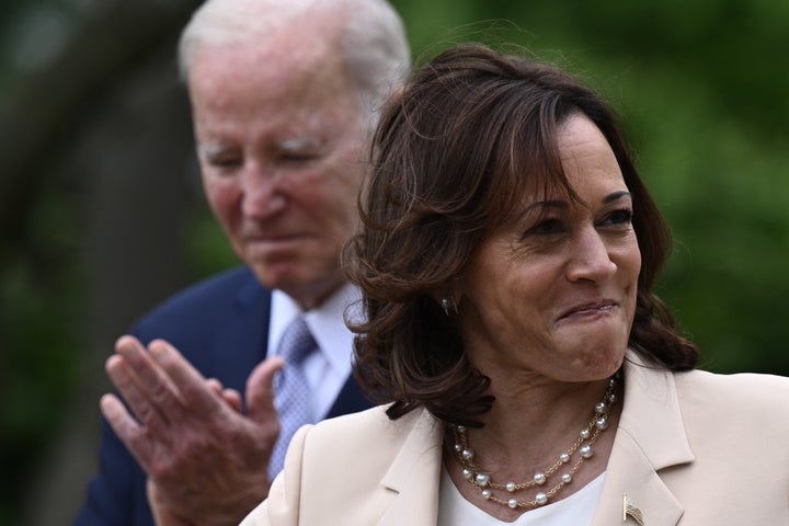 President Joe Biden looks on as Vice President Kamala Harris delivers remarks from the White House Rose Garden on May 1.