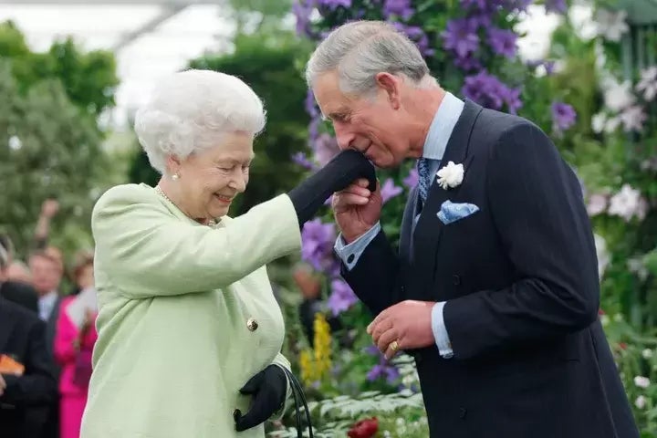 A photo of the late queen elizabeth and then-prince charles on may 18, 2009, in london.