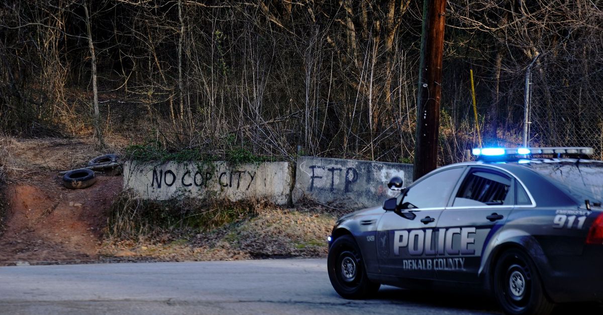 Activists Protesting 'Cop City' RICO Indictment Arrested For Chaining Themselves To Bulldozer