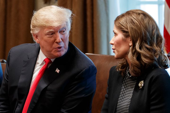 FILE — President Donald Trump speaks to South Dakota Gov.-elect Kristi Noem during a meeting at the White House in 2018.