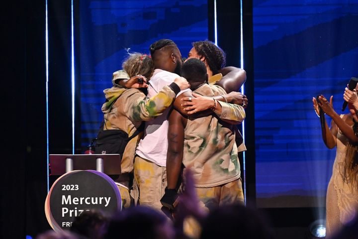 The band share a group hug after their Mercury win