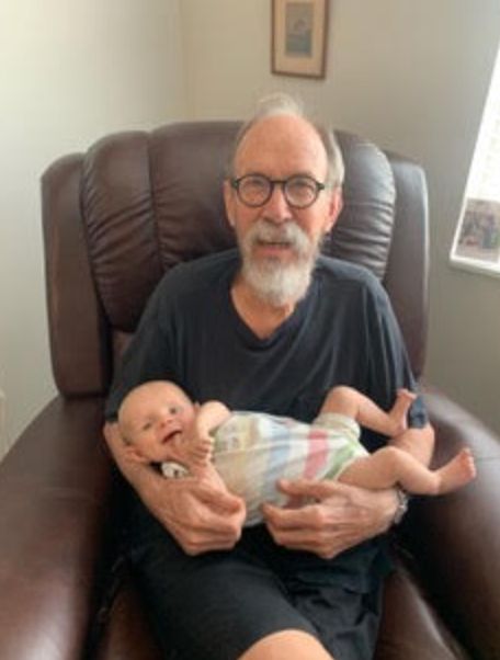 Lee with one of his grandsons in 2021.