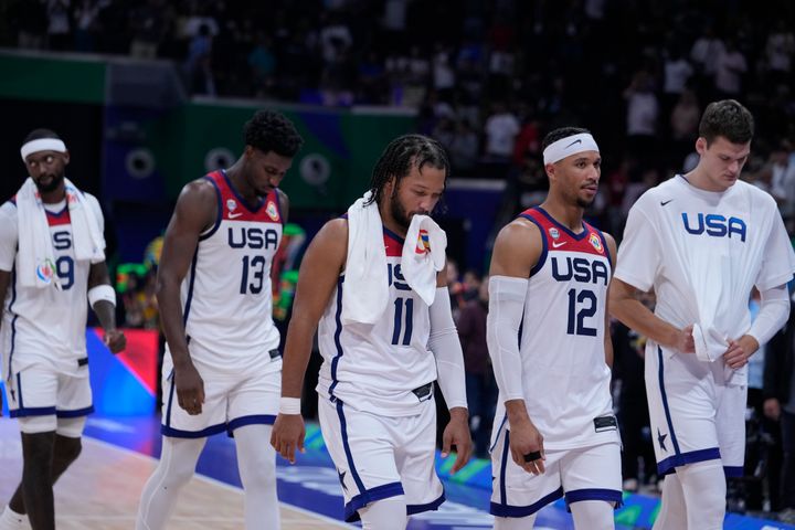 Players form the United States walk off the court ofter their loss to Germany in a Basketball World Cup semi final game in Manila, Philippines, Friday, Sept. 8, 2023. (AP Photo/Michael Conroy)