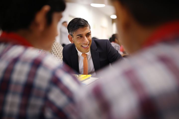 Rishi Sunak meets local schoolchildren at the British Council during an official visit ahead of the G20 Summit.