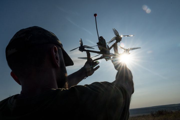 A Ukrainian soldier of 24th brigade prepares a drone as the Russia-Ukraine war continues.