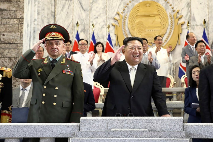 FILE - In this photo provided by the North Korean government, North Korean leader Kim Jong Un, center, Russian Defense Minister Sergei Shoigu, left, and China's Vice Chairman of the standing committee of the country's National People's Congress Li Hongzhong, right, attend a military parade to mark the 70th anniversary of the armistice that halted fighting in the 1950-53 Korean War, on Kim Il Sung Square in Pyongyang, North Korea, on July 27, 2023. Shoigu visited Pyongyang in what the U.S. saw as part of Moscow's efforts to negotiate for supplies of North Korean munitions. (Korean Central News Agency/Korea News Service via AP, File)