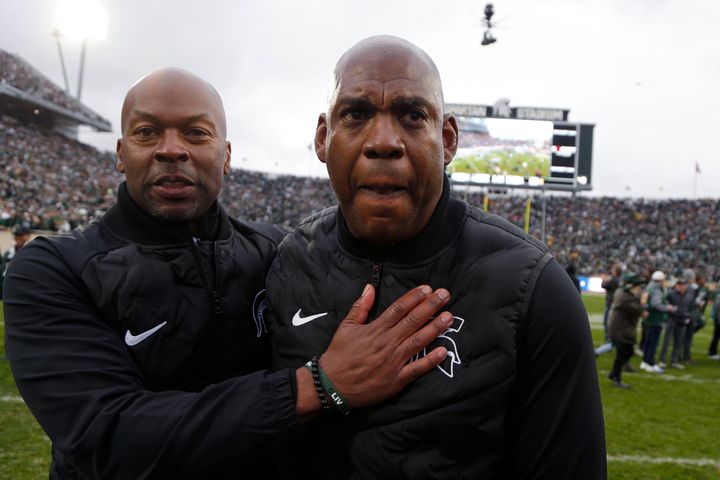 Michigan State coach Mel Tucker, right, is congratulated by athletic director Alan Haller following a 37-33. win over Michigan in an NCAA college football game, Saturday, Oct. 30, 2021, in East Lansing, Mich.Tucker has been suspended without pay after allegations became public that he sexually harassed a rape survivor.
