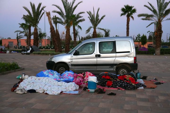 People sleep in an open area for safety against aftershocks on September 10, 2023 in Marrakech, Morocco. 