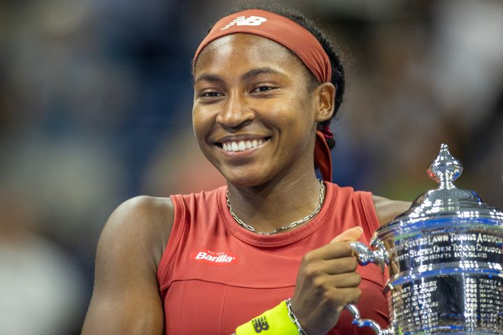 Coco Gauff holding the winners' trophy after her victory in the women's singles final at the U.S. Open.
