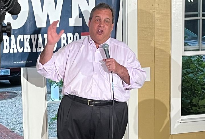 Former New Jersey Gov. Chris Christie speaks to a crowd at former ambassador Scott Brown's "No BS" barbecue series for 2024 presidential candidates.