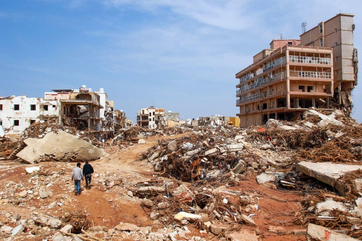 Flash floods in eastern Libya killed more than 2,300 people in the Mediterranean coastal city of Derna alone, the emergency services of the Tripoli-based government said on Tuesday.