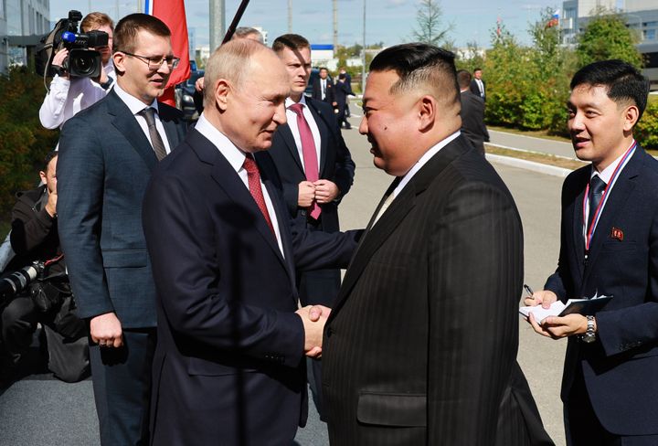 Russian President Vladimir Putin, left, and North Korea's leader Kim Jong Un shake hands during their meeting at the Vostochny cosmodrome outside the city of Tsiolkovsky, about 200 kilometers (125 miles) from the city of Blagoveshchensk in the far eastern Amur region, Russia, on Sept. 13, 2023. 