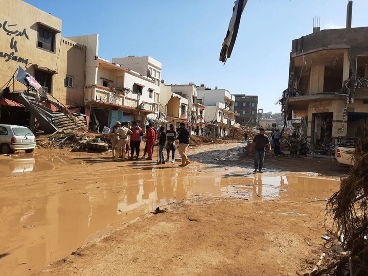 Members of Libyan Red Crescent Ajdabiya operate in a location impacted by flooding.