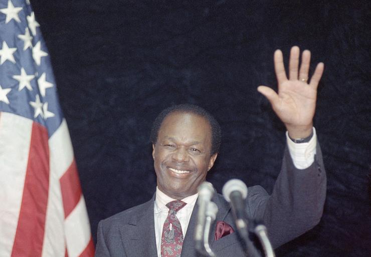 Washington, D.C., Mayor Marion Barry waves to supporters after addressing city employees in Washington in this March 14, 1990, file photo.