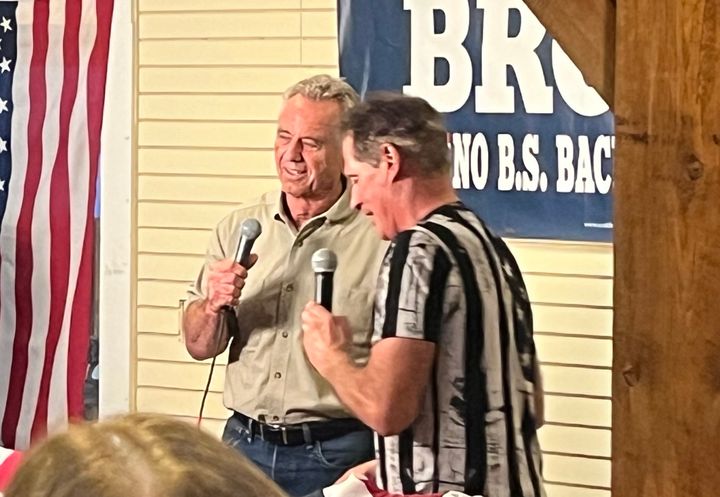Democratic presidential candidate Robert F. Kennedy Jr. appears at former Republican Sen. Scott Brown's "No BS" barbecue campaign gathering in New Hampshire on Wednesday night.