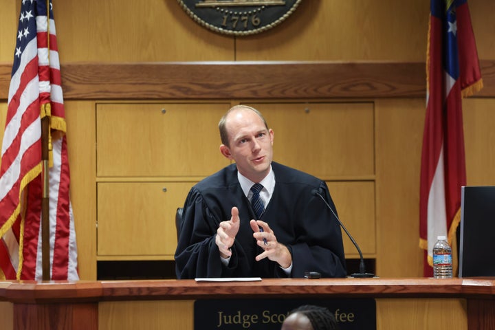 Superior Court Judge Scott McAfee hears motions from attorneys representing Ken Chesebro and Sidney Powell on September 6, 2023 at the Fulton County Courthouse in Atlanta, Georgia. Former U.S. President Donald Trump has entered a not guilty plea and waived his right to appear this week at an arraignment hearing. Trump and his 18 co-defendants are charged in a 41-count indictment accusing them of scheming to overturn Georgia's 2020 presidential election results. (Photo by Jason Getz-Pool/Getty Images)
