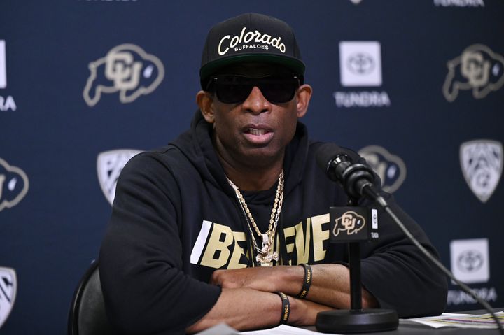 Deion Sanders addresses the press in early August.