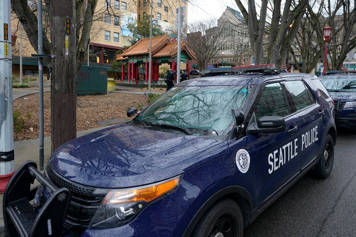 A Seattle Police Department vehicle sits parked at Hing Hay Park in the heart of Seattle's Chinatown-International District, March 18, 2021. A police watchdog agency is investigating a Seattle officer after he was caught on audio mocking the January 2023 death of a young woman who was hit by a speeding police cruiser.