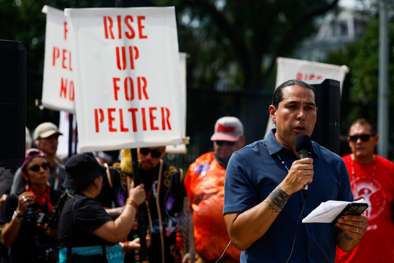 Actor and activist Dallas Goldtooth speaks to the crowd gathered outside the White House to urge clemency for Leonard Peltier.