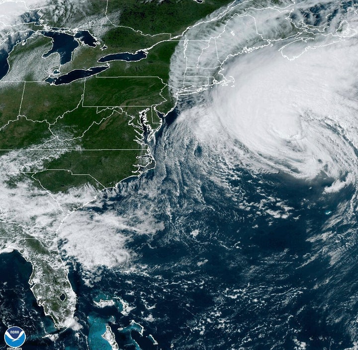This Friday, Sept. 15, 2023, 3:11 p.m. EDT satellite image provided by the National Oceanic and Atmospheric Administration shows Hurricane Lee, right, near New England and Eastern Canada. A tropical storm warning extended from Maine through Massachusetts, with powerful gusts forecast to arrive late in the day in southern New England. Maine and coastal Nova Scotia and New Brunswick are expected to see the brunt of the storm's remnants on Saturday.