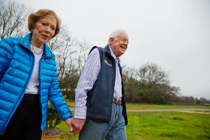 Rosalynn and Jimmy Carter arrive at a ribbon-cutting ceremony for a solar panel project in their hometown of Plains, Georgia, on Feb. 8, 2017.