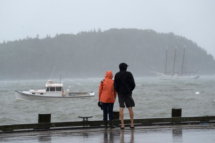 Val and Tobin Peacock watch the rough seas as strong winds and driving rain pelt the coast during storm Lee, Saturday, Sept. 16, 2023 in their hometown of Bar Harbor, Maine. (AP Photo/Robert F. Bukaty)