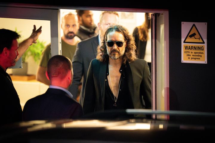 Russell Brand leaves the Troubabour Wembley Park theatre in north-west London after performing a comedy set. He faces claims about his sexual behaviour at the height of his fame. He has vehemently denied the allegations. 