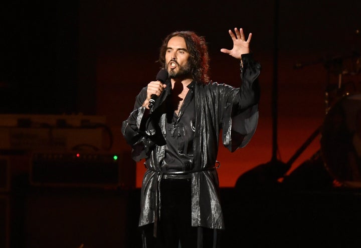 Russell Brand on stage in January 2020