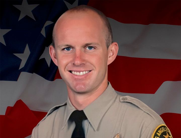 This undated photo provided by Los Angeles County Sheriff's Department shows Deputy Ryan Clinkunbroomer.