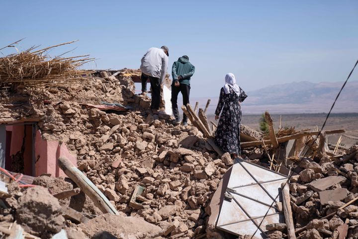 People inspect damage caused by the earthquake that struck the village of Tafaght near Marrakesh, Morocco, on September 11, 2023.