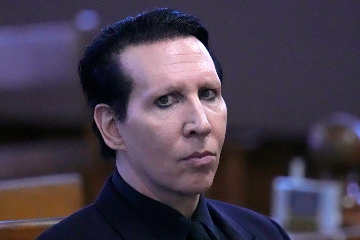 Musical artist Marilyn Manson, whose legal name is Brian Hugh Warner, waits for the judge to arrive in Belknap Superior Court on Monday in Laconia, N.H.