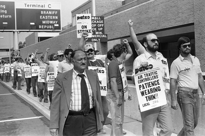 Striking air traffic controllers demonstrate on Aug. 4, 1981, despite President Ronald Reagan's threat to fire them all within 48 hours. (AP Photo/Bill Ingraham)