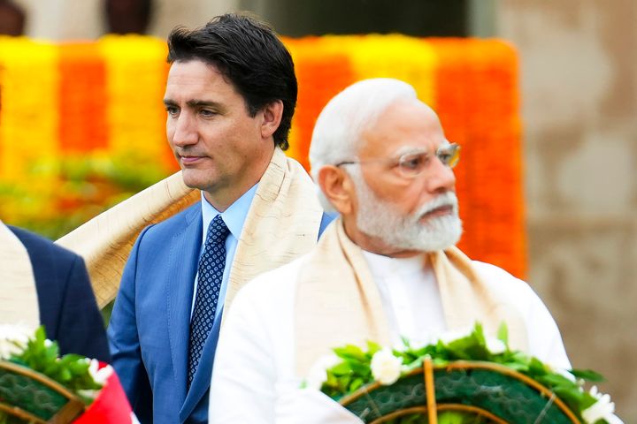 Canada's Prime Minister Justin Trudeau, left, walks past Indian Prime Minister Narendra Modi as they take part in a wreath-laying ceremony at Raj Ghat, Mahatma Gandhi's cremation site, during the G20 Summit in New Delhi, Sunday, Sept. 10, 2023. Trudeau said that Canada wasn't looking to escalate tensions, but asked India on Tuesday, Sept. 19, to take the killing of a Sikh activist seriously after India called accusations that the Indian government may have been involved absurd. (Sean Kilpatrick/The Canadian Press via AP, File)