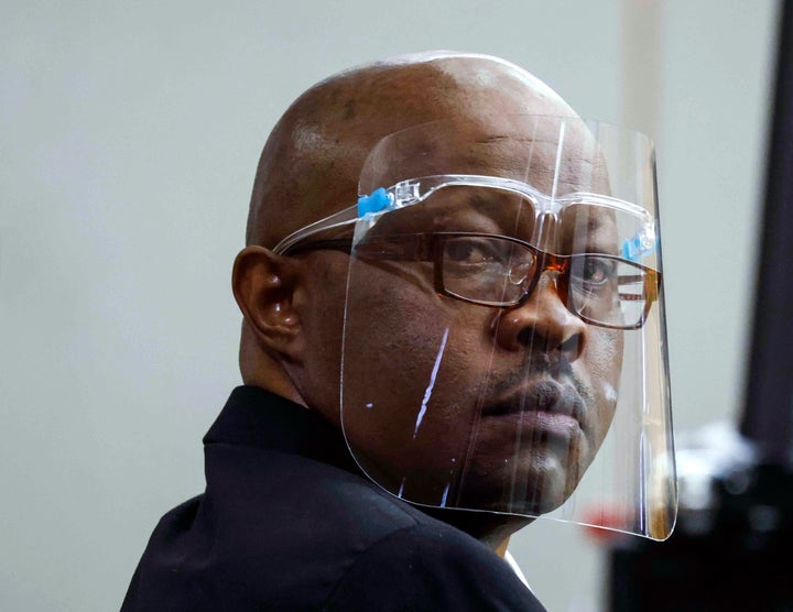 Accused serial killer Billy Chemirmir looks back during his retrial on April 25, 2022, at Frank Crowley Courts Building in Dallas.