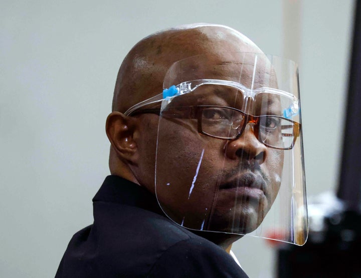 Accused serial killer Billy Chemirmir looks back during his retrial on April 25, 2022, at Frank Crowley Courts Building in Dallas. 