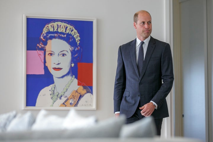 Prince William walks near an Andy Warhol print of his late grandmother, Queen Elizabeth II, to meet the president of Ecuador, Guillermo Lasso, on Sep. 19, 2023.