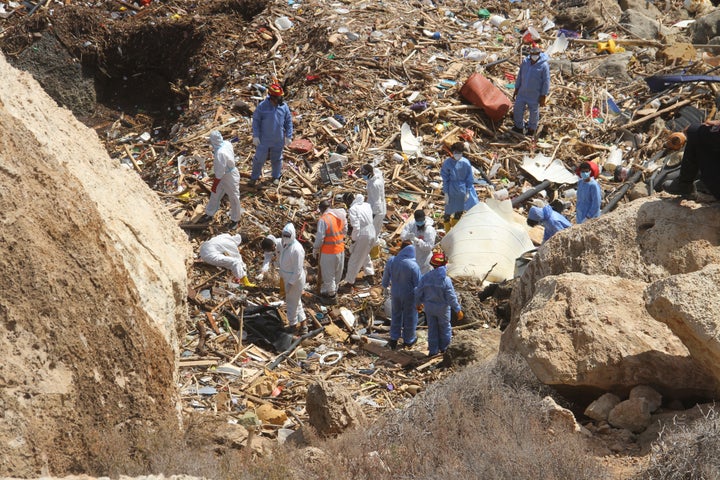 Rescue teams look for flash flood victims in the city of Derna, Libya, Monday, Sept. 18, 2023. Mediterranean storm Daniel caused flooding that overwhelmed two dams, sending a wall of water through the city. More than 10,000 were killed, and another 10,000 are missing. (AP Photo/Yousef Murad)