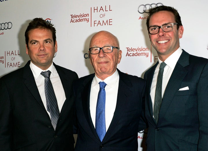 Rupert Murdoch is seen with his sons, Lachlan, left, and James Murdoch, in 2014.